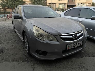 машины 2010 года и выше: Subaru Legacy Touring Wagon (универсал), левый руль, серебристый цвет