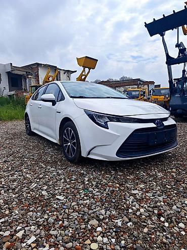 левин гибрид: Toyota Corolla: 2023 г., 1.8 л, Гибрид, Седан — 1