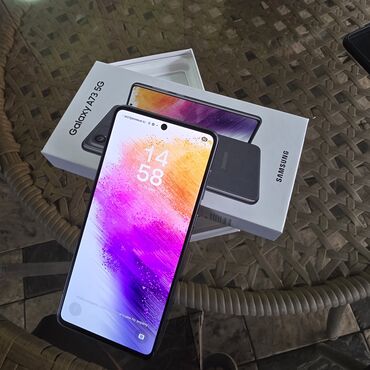стиральная машина б: Samsung Galaxy A73 5G, Колдонулган, 256 ГБ, түсү - Боз, 2 SIM