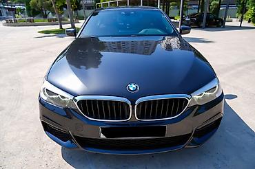 mini cooper satilir: BMW 5 Series sedan – qara metalik rəng, dinamiki və zərif dizayn — 2