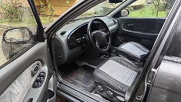 avto karavan: Kia Cerato: 1.8 l | 2002 il Sedan — 9