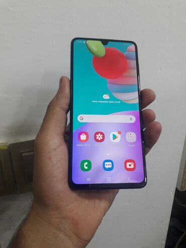 телефон fly cirrus 9: Samsung Galaxy A41, 64 ГБ, цвет - Черный, Сенсорный, Отпечаток пальца, Две SIM карты