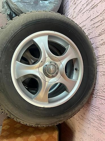 шины 235 70 16: Комплект шин Bridgestone на дисках - Бренд шин: Bridgestone - Тип — 1