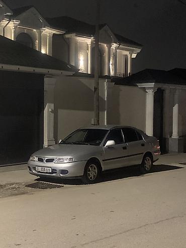 срочное: Mitsubishi Carisma: 1999 г., 1.8 л, Механика, Бензин, Седан — 9