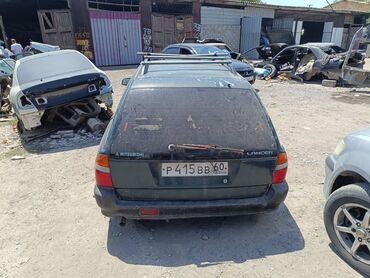 запчасти на митсубиси лансер 9: Универсал Mitsubishi Lancer, модель пятого поколения, в темно-зеленом