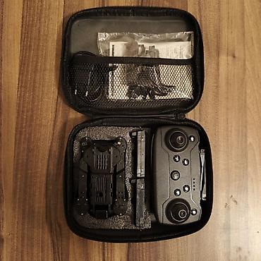 oyuncaq evlər: Qatlanan mini dron + pult dəsti Xüsusiyyətlər: - Qatlanan — 4