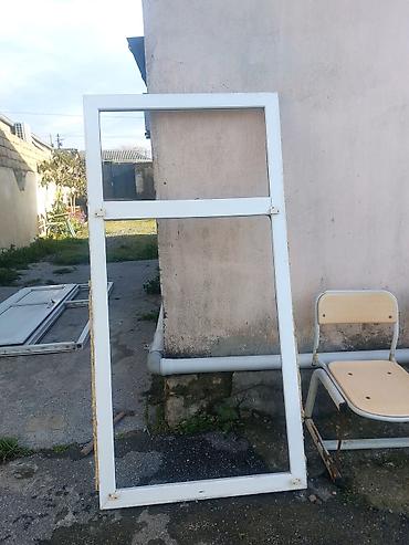 plasik qapi: 1 ci pencere eni 77 uzunu 177. 2 ci pencere eni 87.5 uzunu — 2