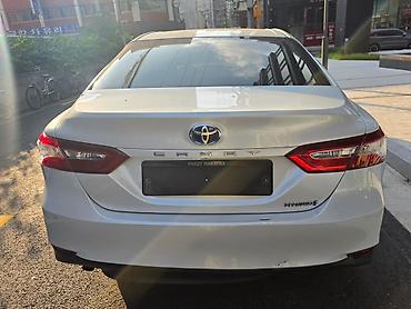 е 2 машина: Toyota Camry: 2020 г., 2.5 л, Вариатор, Гибрид, Седан — 2
