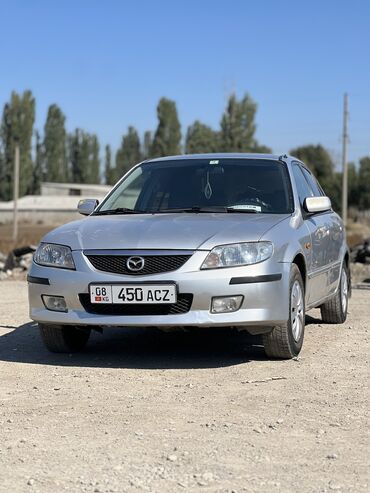 Mazda: Mazda 323: 2001 г., 1.6 л, Механика, Бензин, Седан