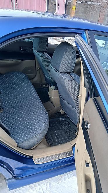 Другие детали салона: Mazda Atenza (правый руль) — интерьер - Салон бежево‑черный, тканевые — 4