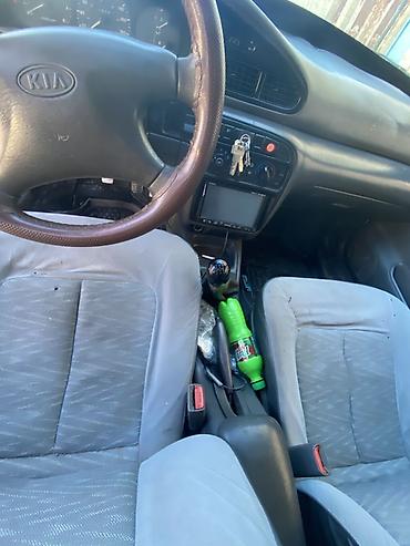 Kia: Kia Sephia: 1.5 l | 1997 il Sedan — 11