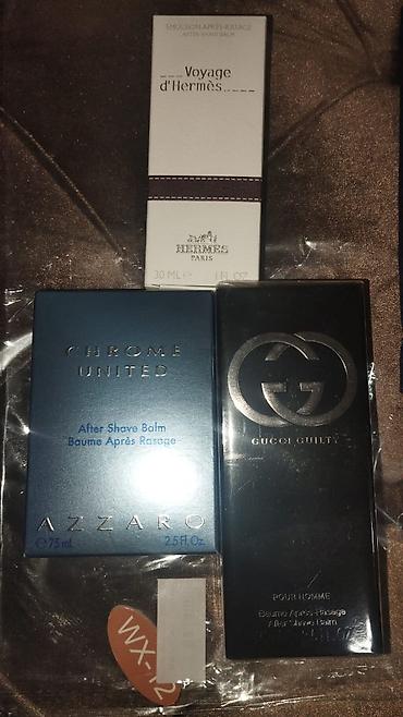 gucci jaket: Kişilər üçün after shave balmları dəsti Məhsullar: - Hermès Voyage — 1