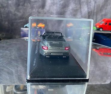 boks sekilleri: Kolleksiya ücün avtomobil modeli Porsche 911 997II Carerra GTS — 9