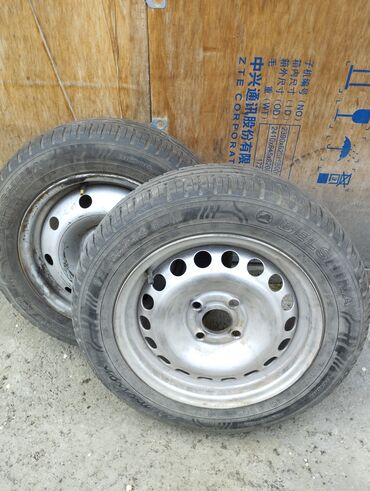 Шины: Продаю шины 175/65R14 82H вместе с дисками 5000 сом пара