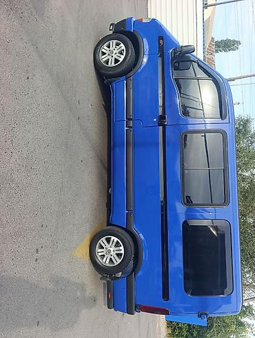 Унаа: Nissan Vanette: 2002 г., 2.2 л, Кол менен иштөөчү, Дизель, Бус — 2