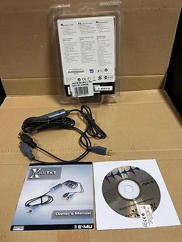 Druga oprema za računare i laptopove: E-MU Xmidi 1x1 – USB na MIDI interfejs kabl Opis: - Kompaktan — 2