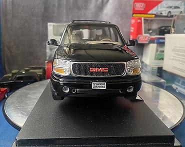 Avtomobil modelləri: Коллекционная модель GMC Yukon Denali black 2001 Welly Art  — 9