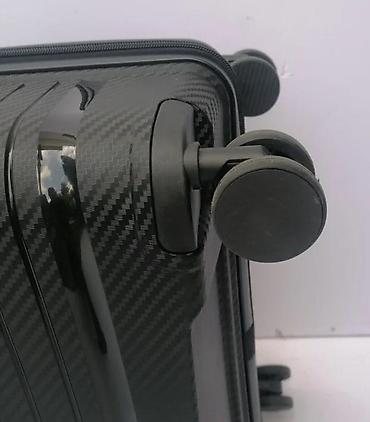 Putni koferi i torbe: Tvrdi kofer na točkićima – crni, sa teksturom karbona - Materijal — 5