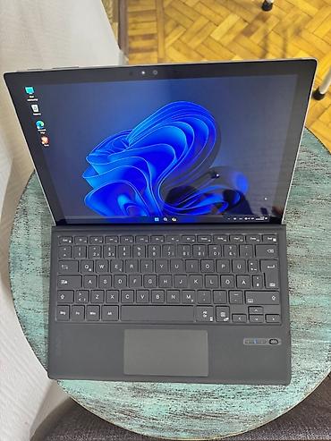 Ноутбуки Microsoft: Microsoft Surface Pro 4 (1724) с i5-6300U, 8 ГБ оперативной памяти и — 12