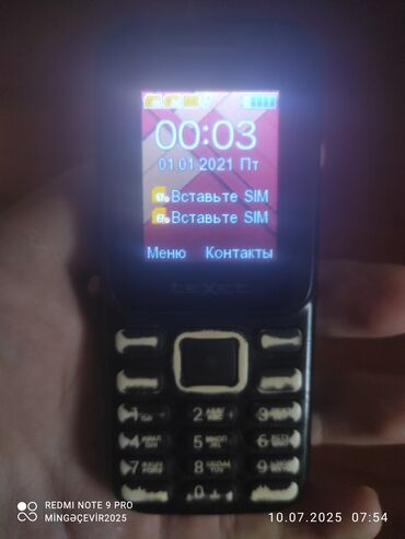 Kompüter, noutbuk və planşetlər: TeXet markalı bu qara rəngli düyməli telefon, əsas zəng və mesajlaşma