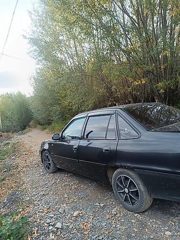 385 55: Daewoo Nexia: 2012 г., Седан — 2