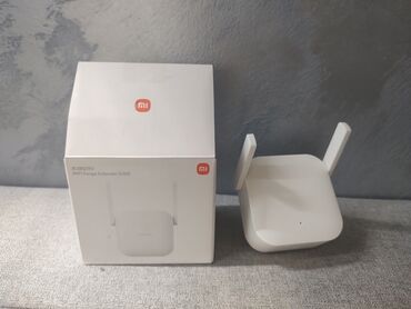 Modemi, ruteri i mrežni uređaji: Nov nekoriscen wifi ruter exyender n300. na slikama specifikacije