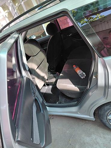 выхлоп w211: Ford Focus: 2003 г., Механика, Универсал — 5