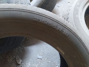 шины на сельхозтехнику: Шина с параметрами 215/55 R18, предназначенная для легковых