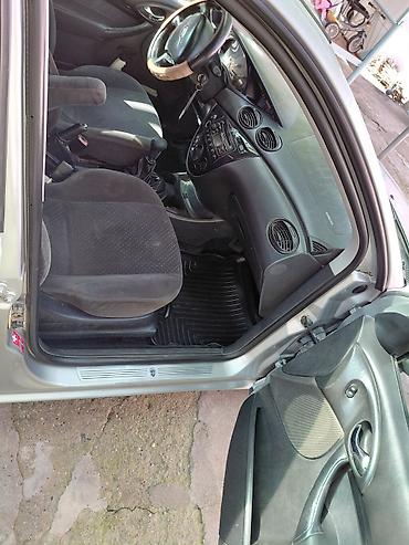 выхлоп w211: Ford Focus: 2003 г., Механика, Универсал — 1