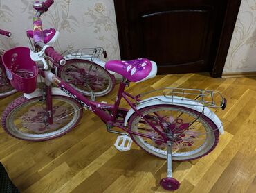 uşaq xonça: 2 eded cüt velosipet . 10 yaşa kimi.Tezedir 1.2 defe evde sürülüb