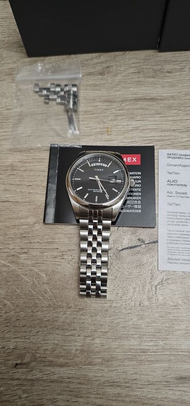 kişi köynekleri: Qol saatı, Timex