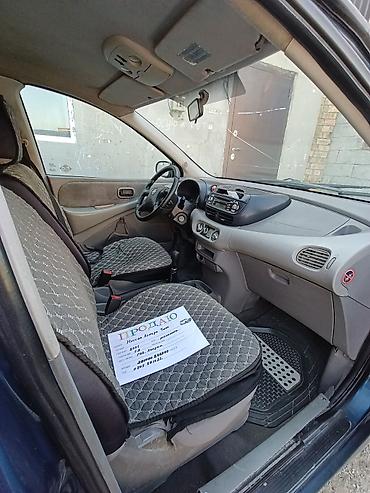 kamri 70: Nissan Almera Tino: 2001 г., 1.8 л, Механика, Бензин — 4