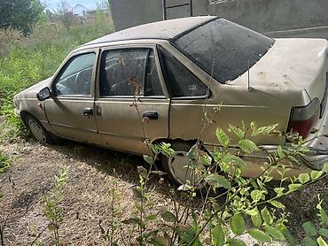 тирактир 80: Daewoo Nexia: 2006 г., Седан — 2