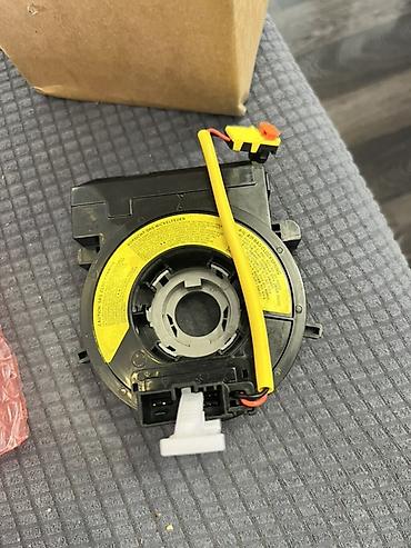 Lentlər: Məhsul: SRS/airbag sükan lent kabeli (clock spring) Təsvir: - Sükanın — 1