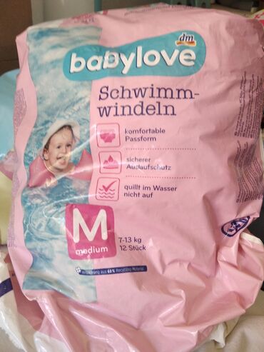 haljinice za bebe: Bebi pelene za kupanje.Za decu od 7-13 kg. Ostalo mi 9 komada od ovog
