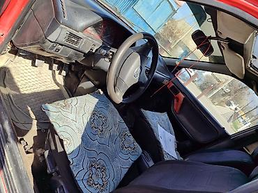 mazda demio авто: Mazda 323: 1991 г., 1.6 л, Механика, Бензин, Седан — 9