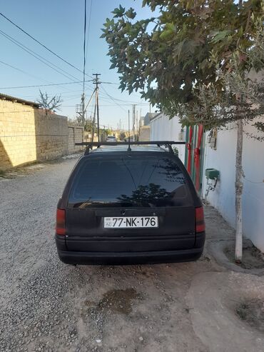 Opel: Model: Opel Astra F Caravan (universal kuzov) Rəng: qara Dövlət nömrə — 15