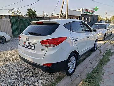 парковочная автовизитка: Hyundai Tucson: 2010 г., 2 л, Автомат, Дизель, Кроссовер — 3