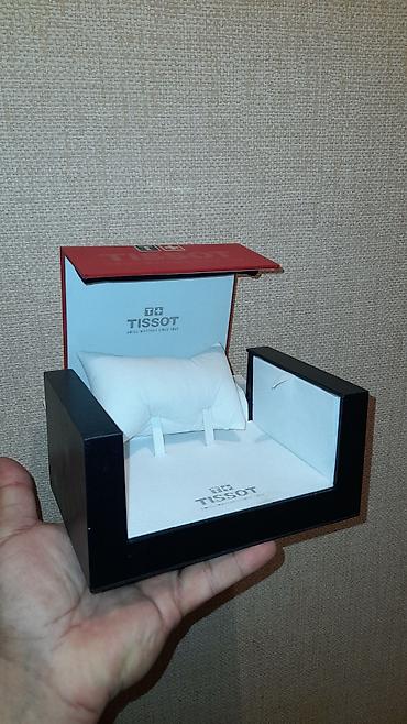 kəllə qənd xonçası: Tissot Qutusu — 2