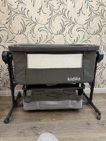 Отдам детскую прикроватную кроватку Kidilo Кроватка почти как новая