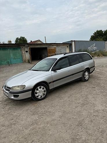 Opel: Opel Omega: 1996 г., 2 л, Механика, Бензин, Универсал — 7
