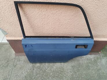 Auto delovi: Vrata zadnja leva Lada 2107 Riva,2105 u plavoj boji ZL2 . Vrata su — 2