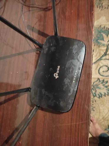 wifi modem satilir: Tp Link Orginal 4 qulaqli Modem tam işlək vəziyyətdədir. Dalğa Yayımı — 2