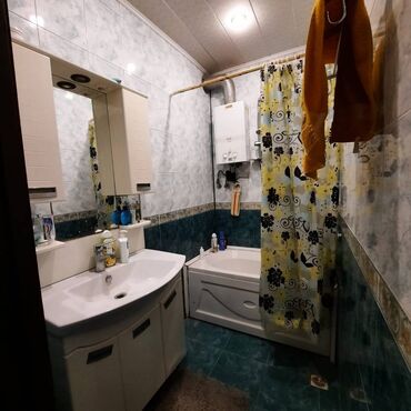 Köhnə tikili: Suraxanı rayonun yeni Günəşli qəsəbəsində Masiv D ərazisində — 13