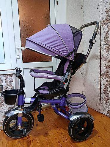 işlenmiş velosipedler: Uşaq üçtəkərli velosiped-araba, bənövşəyi rəngdə. Xüsusiyyətlər: - — 4