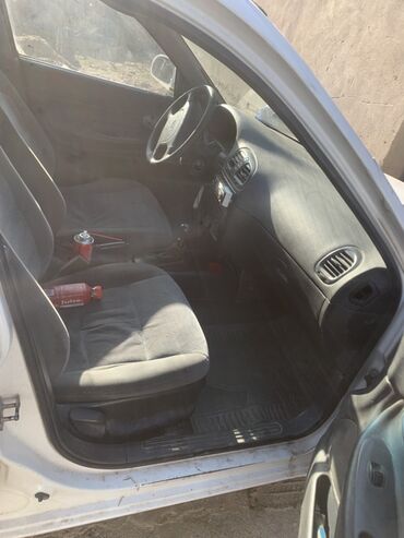 Daewoo: Daewoo Nubira: 1996 г., 1.5 л, Механика, Бензин, Седан — 2