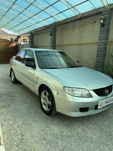 авто симулятор: Mazda Protege: 2002 г., 2 л, Автомат, Бензин, Седан