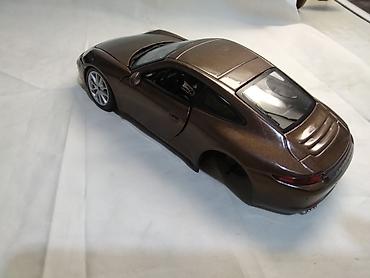 casio zeleni sat: Burago Porsche 911 Carrera S,fale 4(a ne 3) tocka,ostalo ok,China — 1