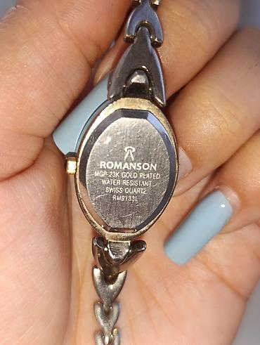 romanson saat: Romanson qadın qol saatı - Model: RM9133L (arxa qapaqda qeyd olunub) — 2