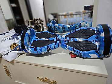 Giroskuterlər: Məhsul: Elektrik hoverboard (self‑balancing skuter) Xüsusiyyətlər: - — 6